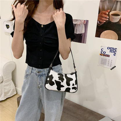 Retro Cow Print Baguette Bag for Women – Trendy Shoulder Purse with Bold Animal Print