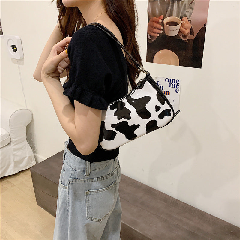 Retro Cow Print Baguette Bag for Women – Trendy Shoulder Purse with Bold Animal Print